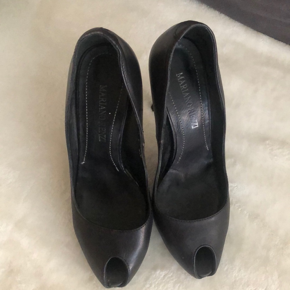 Black leather high heel shoes